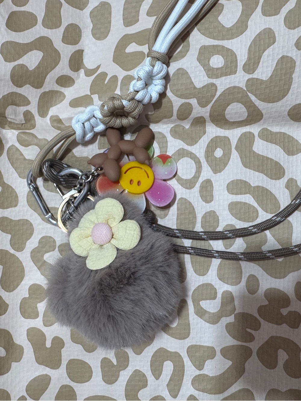 Gray Furry Pom Pom Keychain with Yellow Flower Charm